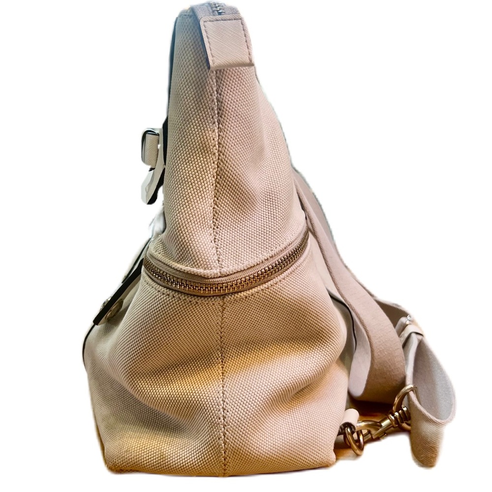 Henri Bendel Jetsetter convertible backpack with purple interior lining. - Picture 7 of 15